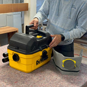 Reusable dust bag for DeWalt DXV04T/DXV15T shown with vacuum cleaner accessories