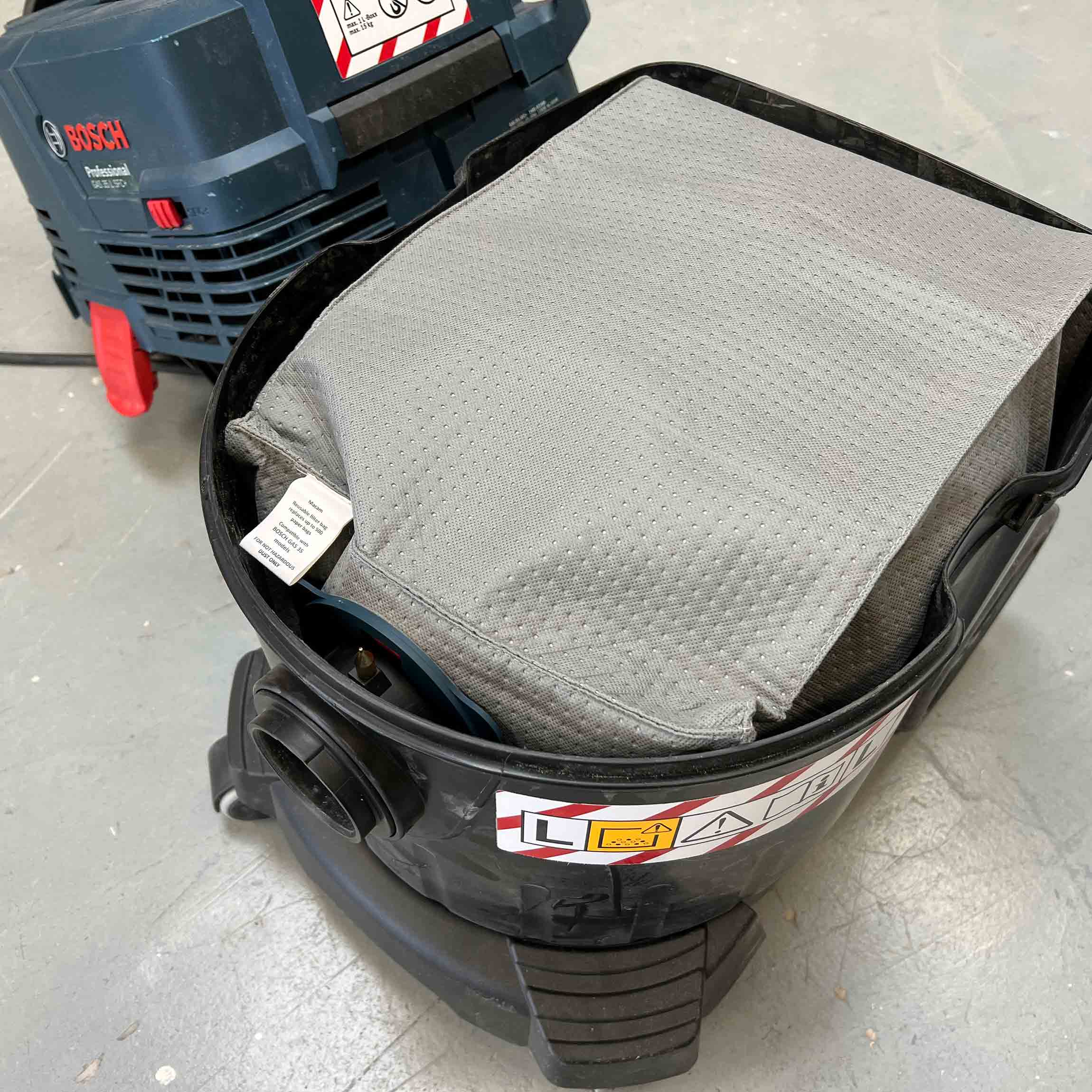 Reusable dust bag for Bosch GAS 35 emptied and shaken out for reuse
