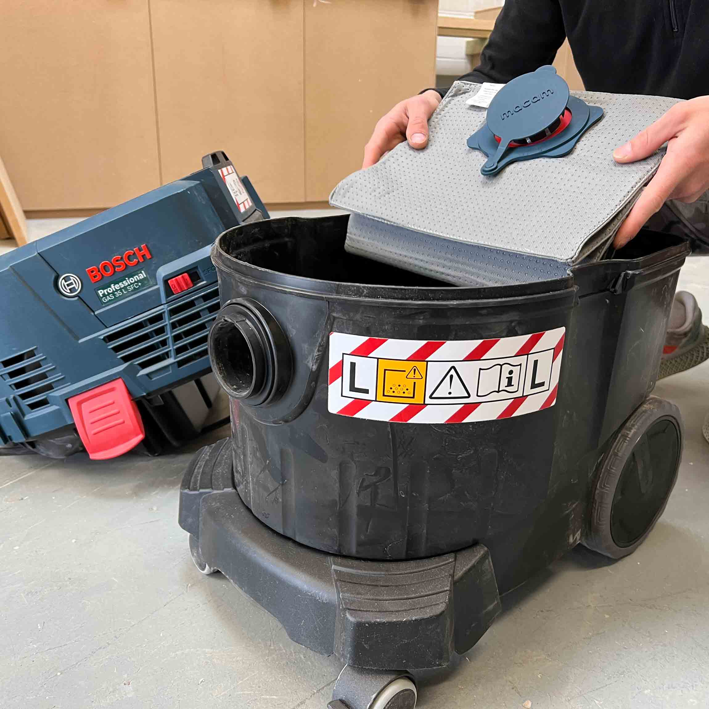 Close-up of the reusable dust bag fabric and collar for Bosch GAS 35